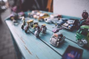 Toy Cars and Motor Bikes in three rows